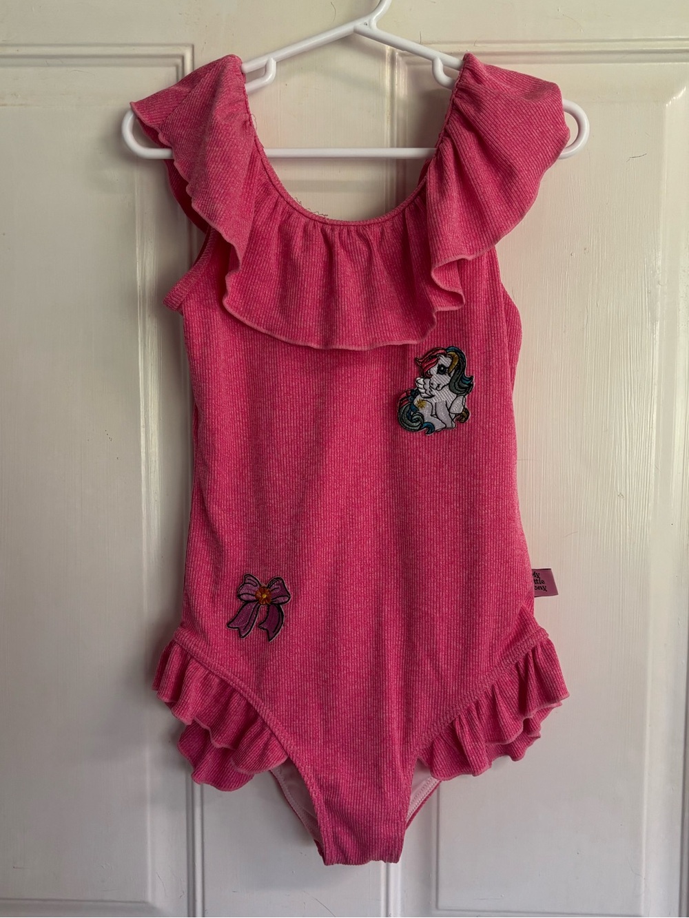 Size 8 Hasbro vibrant pink ribbed little pony patch one-piece swimsuit. In EUC!